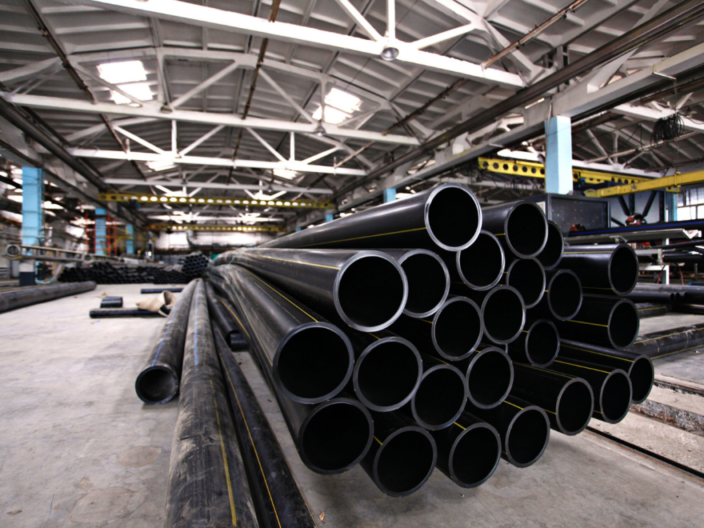 black plumbing pipes stacked in warehouse Veteran Air